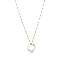 Tiffany & Co. Tiffany T pendant in 18k gold with a baguette diamond. | ^ Necklaces & Pendants|Men's Jewelry