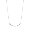Tiffany & Co. Tiffany T smile pendant in 18k white gold with pink sapphires, small. | ^ Necklaces & Pendants|Colored Gemstone Jewelry