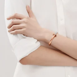 Tiffany & Co. Tiffany T T1 wide hinged bangle in 18k rose gold with baguette diamonds, large. | ^ Bracelets|Rose Gold Jewelry