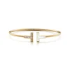 Tiffany & Co. Tiffany T Wire Bracelet in Yellow Gold with Mother-of-pearl and Diamonds | ^ Bracelets|Gold Jewelry