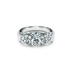 Tiffany & Co. Tiffany Three Stone engagement ring in platinum: an expression of eternal love. | ^ Engagement Rings
