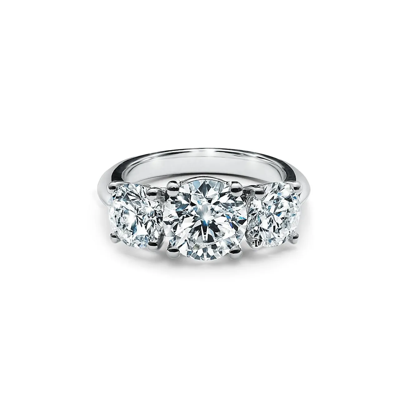 Tiffany & Co. Tiffany Three Stone engagement ring in platinum: an expression of eternal love. | ^ Engagement Rings