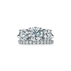 Tiffany & Co. Tiffany Three Stone engagement ring in platinum: an expression of eternal love. | ^ Engagement Rings