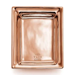 Tiffany & Co. Vide poche in porcelain with a rose gold hand-painted finish. | ^ The Home|Housewarming Gifts